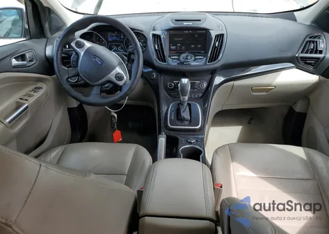 2014 Ford Escape Titanium z USA, uszkodzony, nr VIN 1FMCU0J95EUB23559